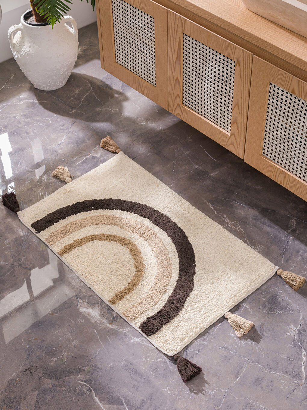 Tapis de bain avec détails à pompons 50x70 cm