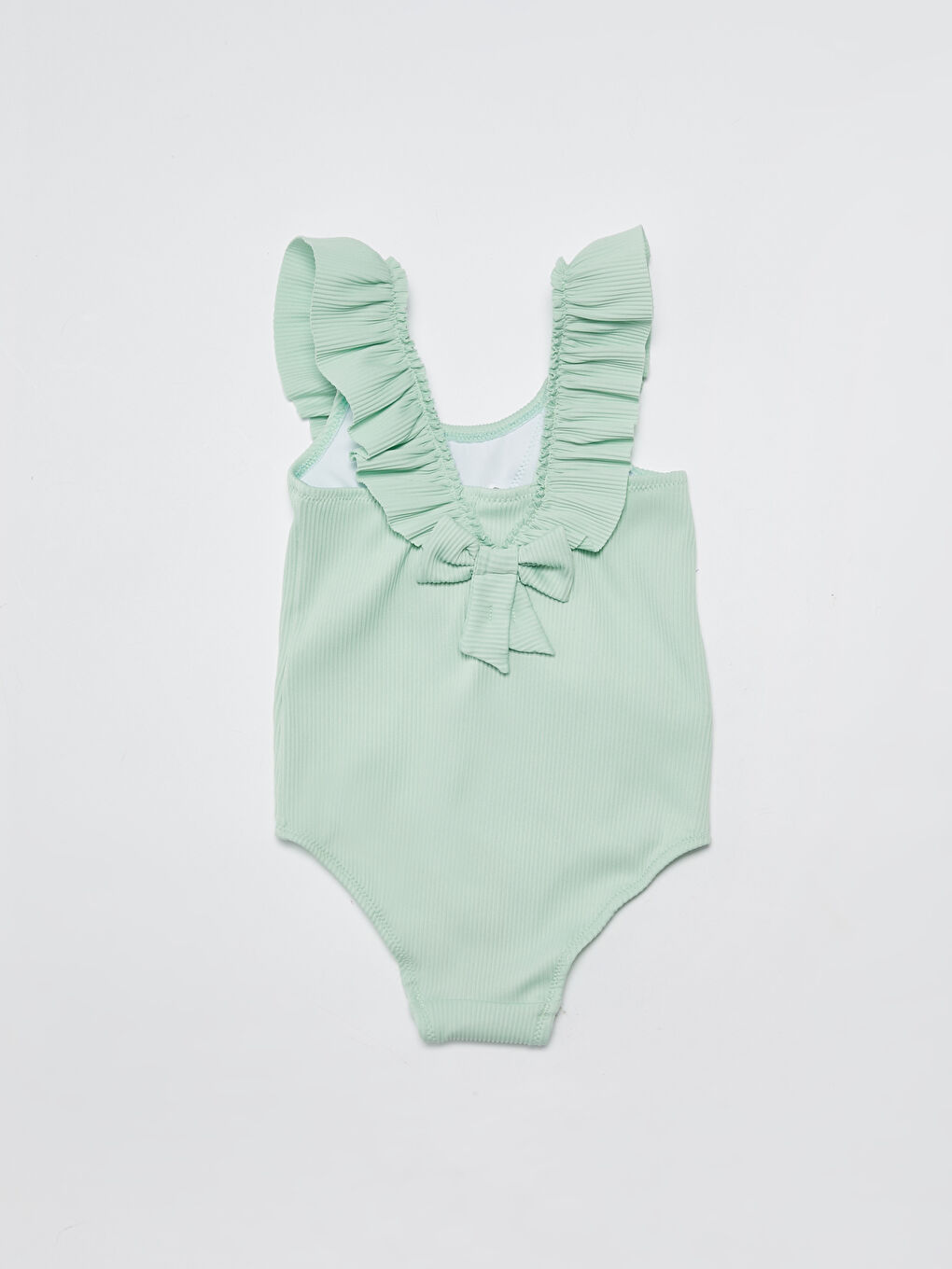 Maillot de bain bébé fille en tissu flexible avec détail volant-1