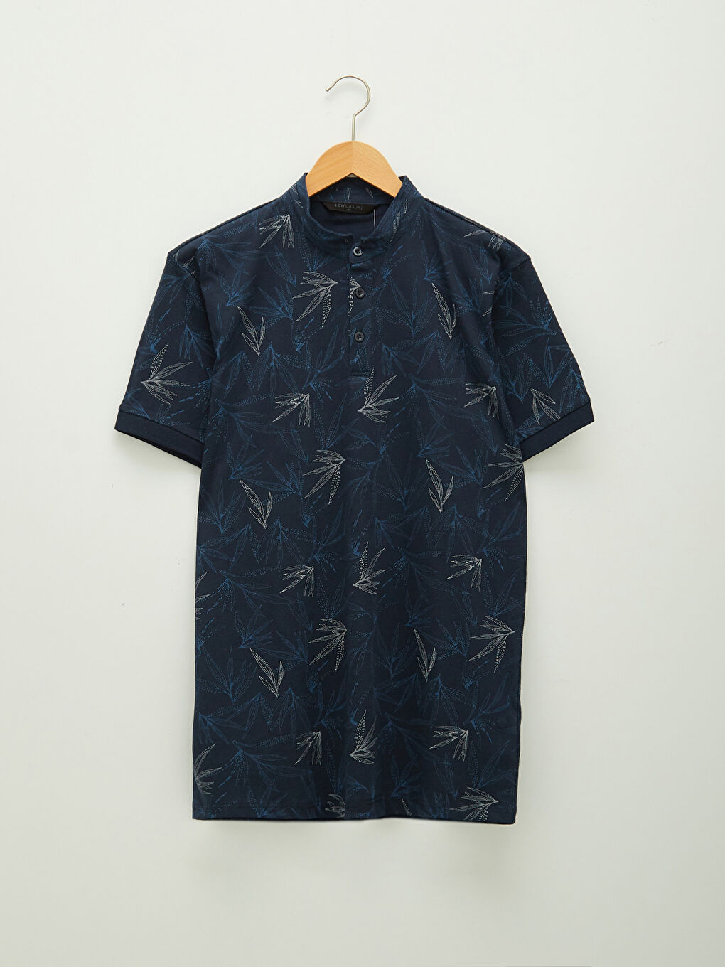 Ерлерге арналған поло жағалы қысқа жең өрнекті трикотаж футболка