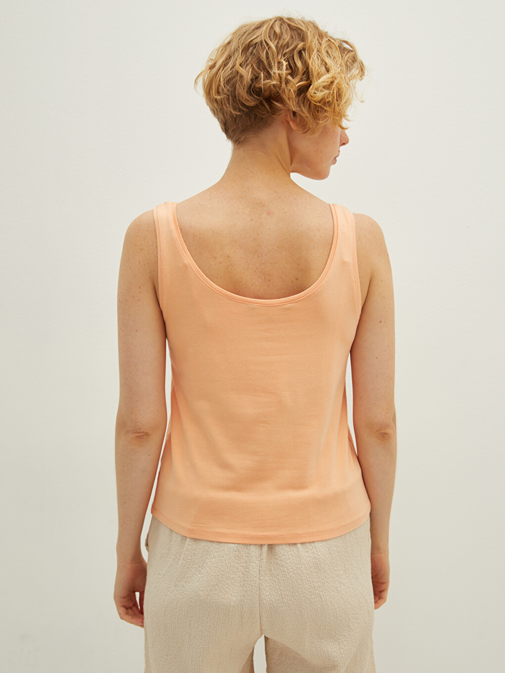 Female U Neck Strapped Straight Athlete-4