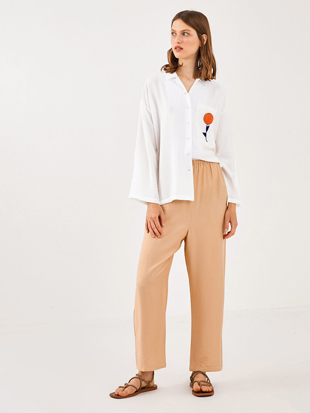 Bej Beli Lastikli Bol Fit Cep Detaylı Kadın Harem Pantolon-1