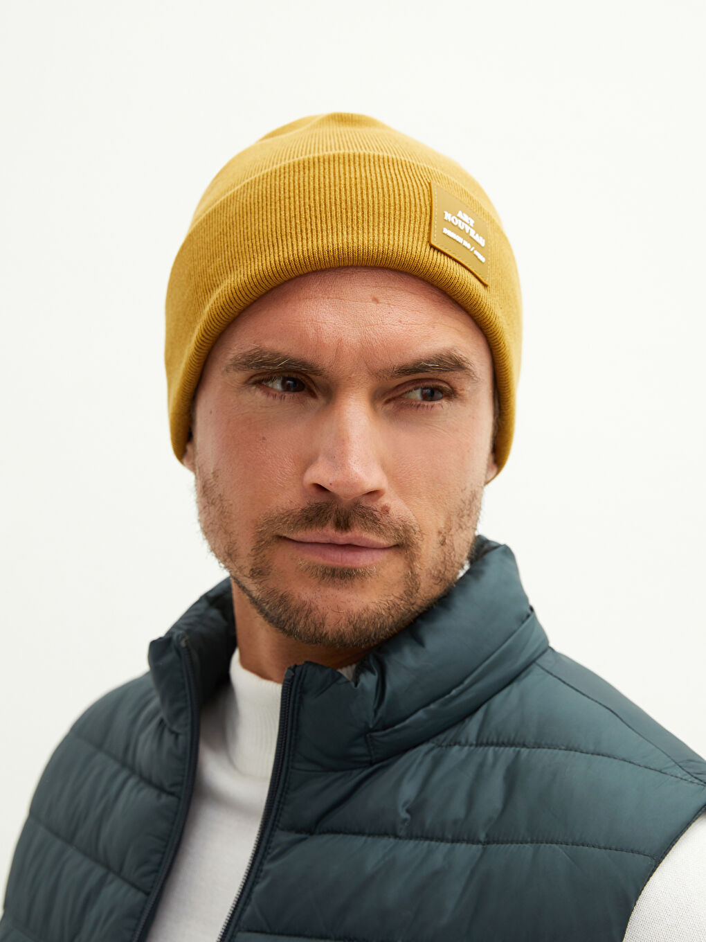 Sarı Etiket Detaylı Erkek Triko Bere