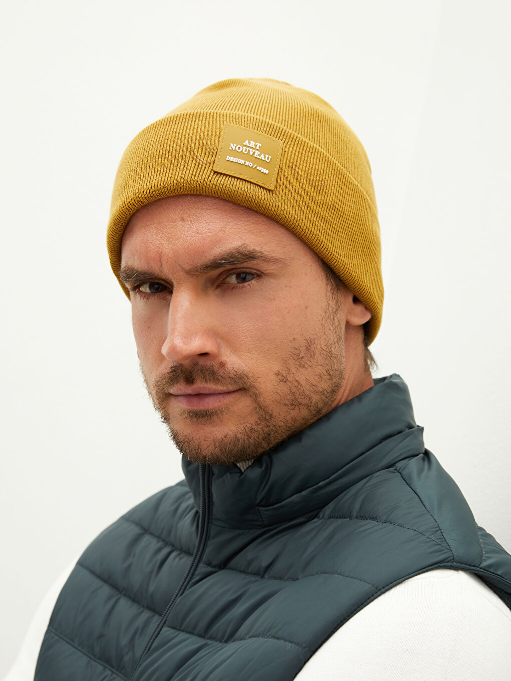 Sarı Etiket Detaylı Erkek Triko Bere-1