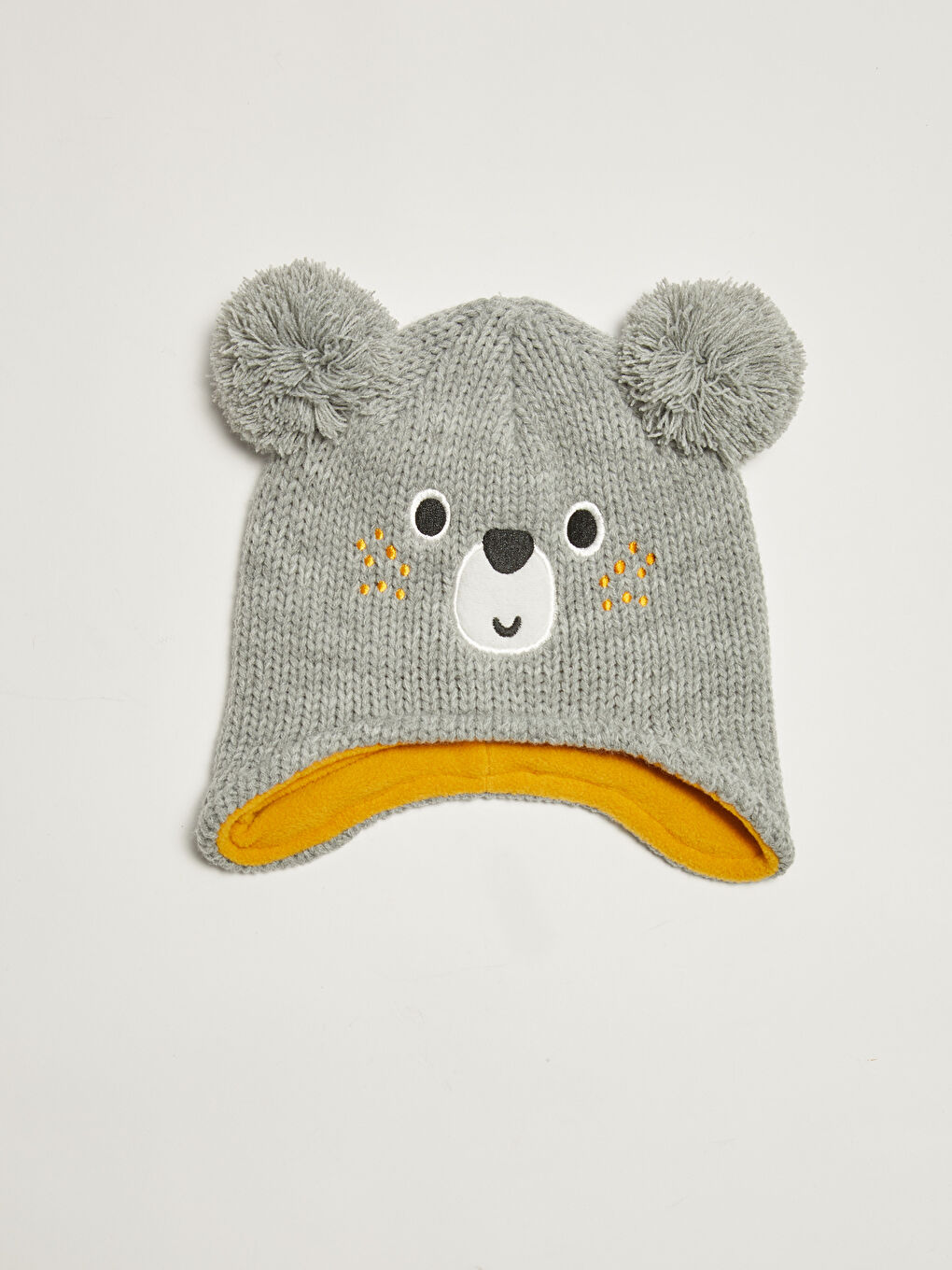 Шапка из трикотажа для малышей унисекс с вышивкой