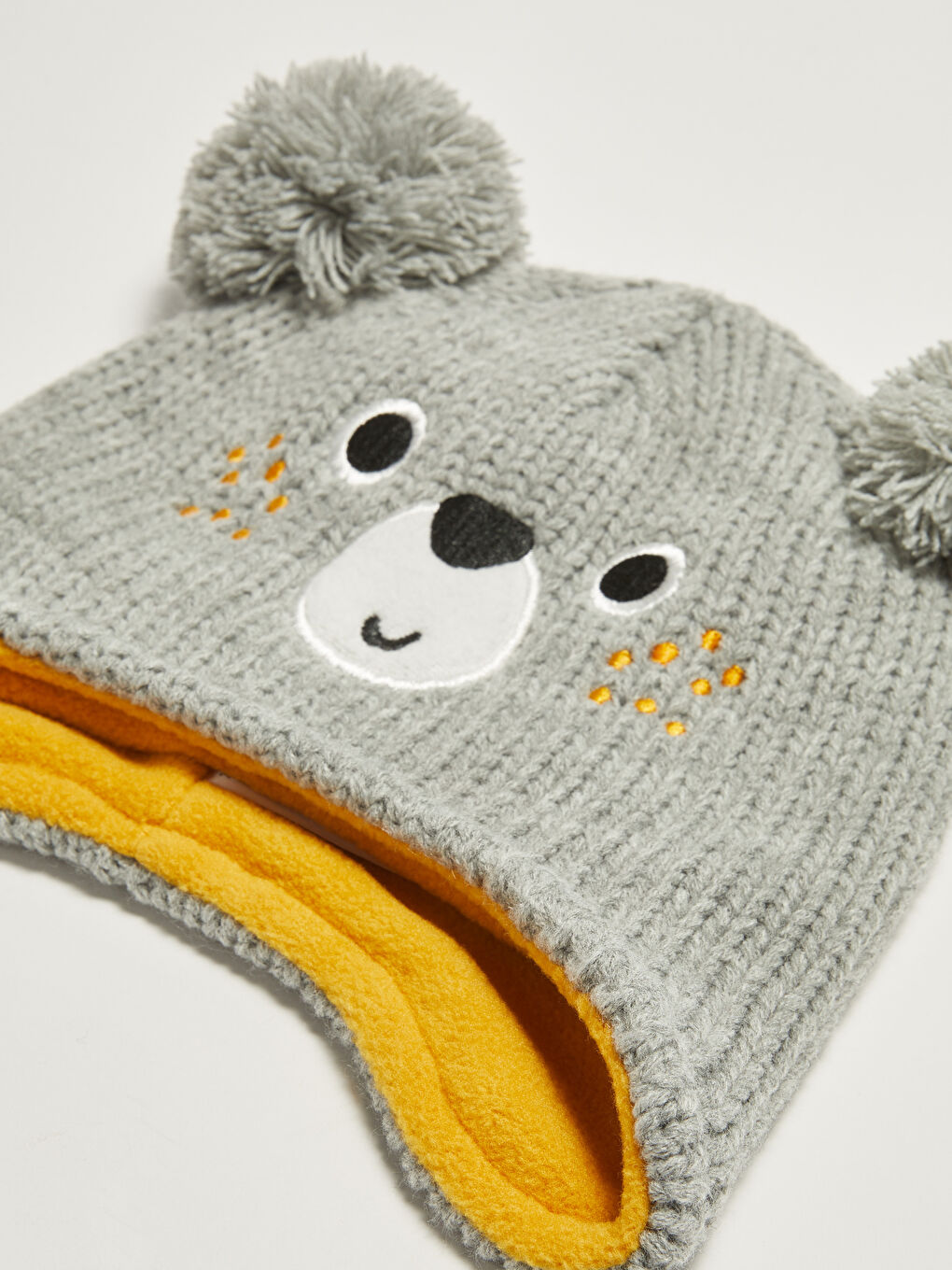 Шапка из трикотажа для малышей унисекс с вышивкой-1