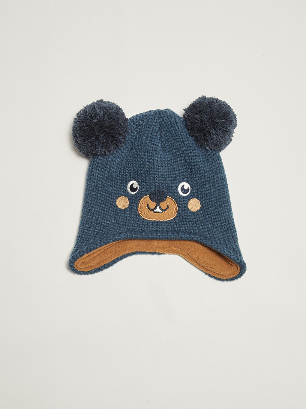 كاب تريكو أطفال بتطريز تفصيلي للجنسين