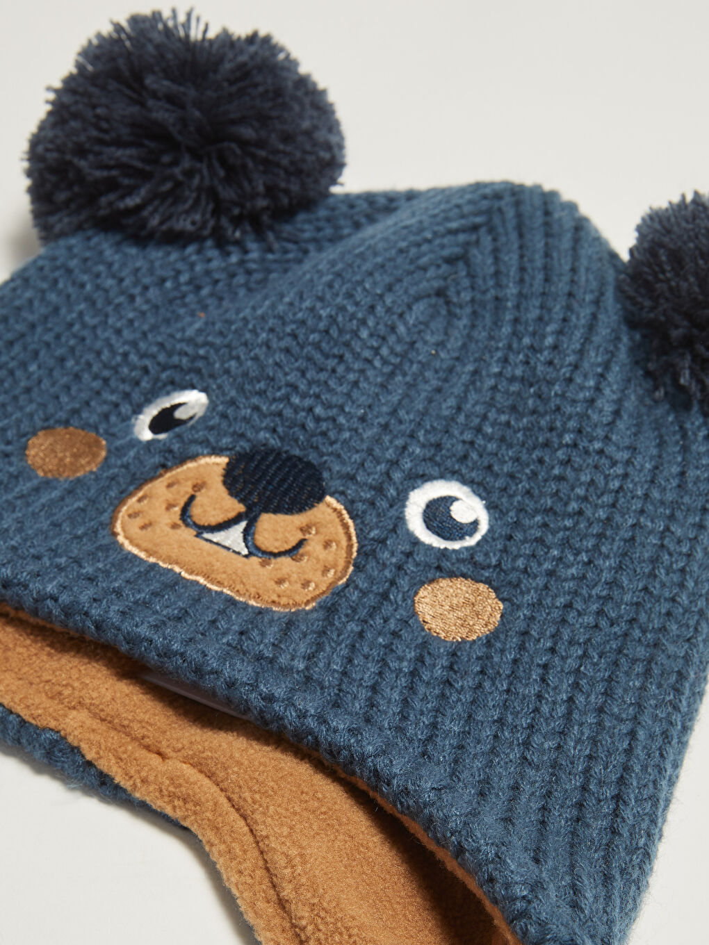 كاب تريكو أطفال بتطريز تفصيلي للجنسين-1