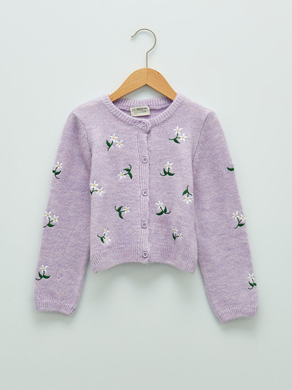 Кардиган трикотажний дівчачий з круглим вирізом горловини, довгим рукавом та вишитими деталями