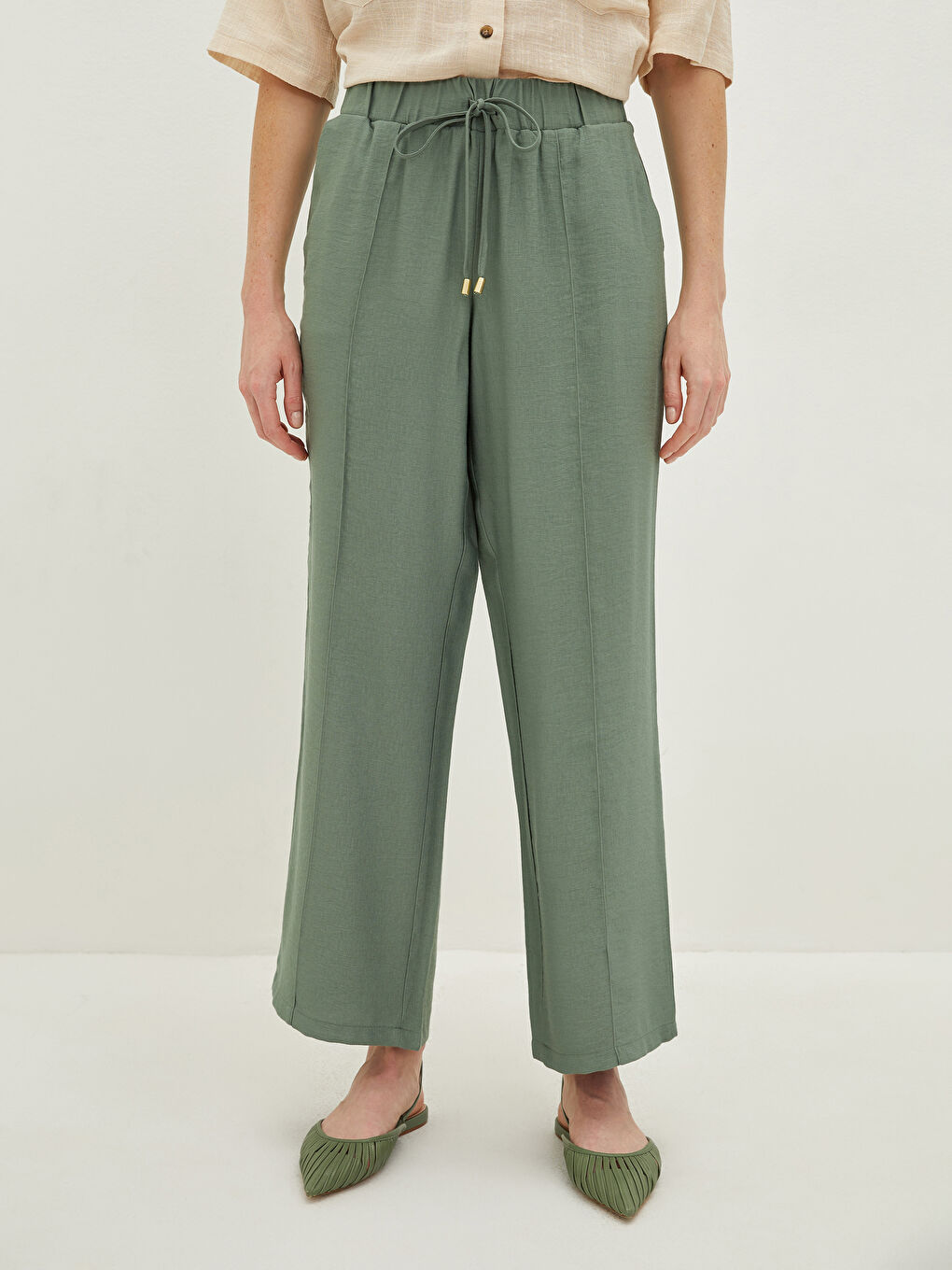 Hose mit elastischem Bund, lockerer Passform, regulären Taschen und Details für Damen-3