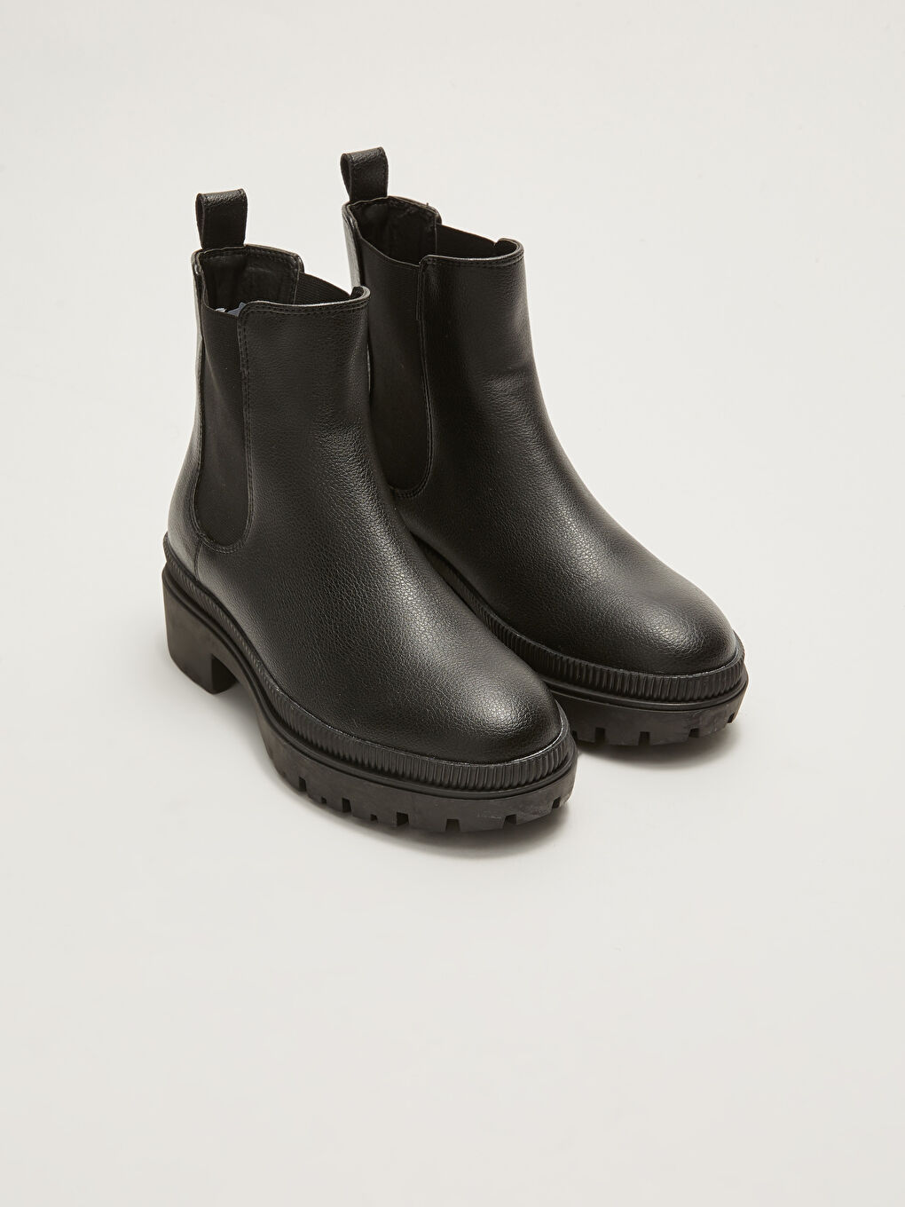 Әйелдерге арналған былғары көріністі резеңке жақтары бар етік