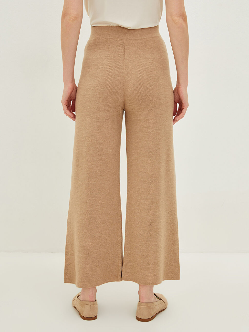 LCWAIKIKI Basic Pantalone od trikotaže sa elastičnim strukom, uskim krojem i širokim nogavicama za žene -W1BG73Z8-DGF