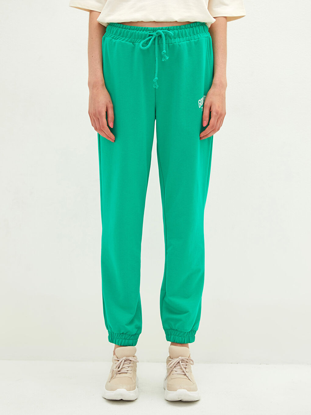 بنطلون رياضي بخصر مطاطي ومطبوع بتفاصيل جيب للسيدات-7