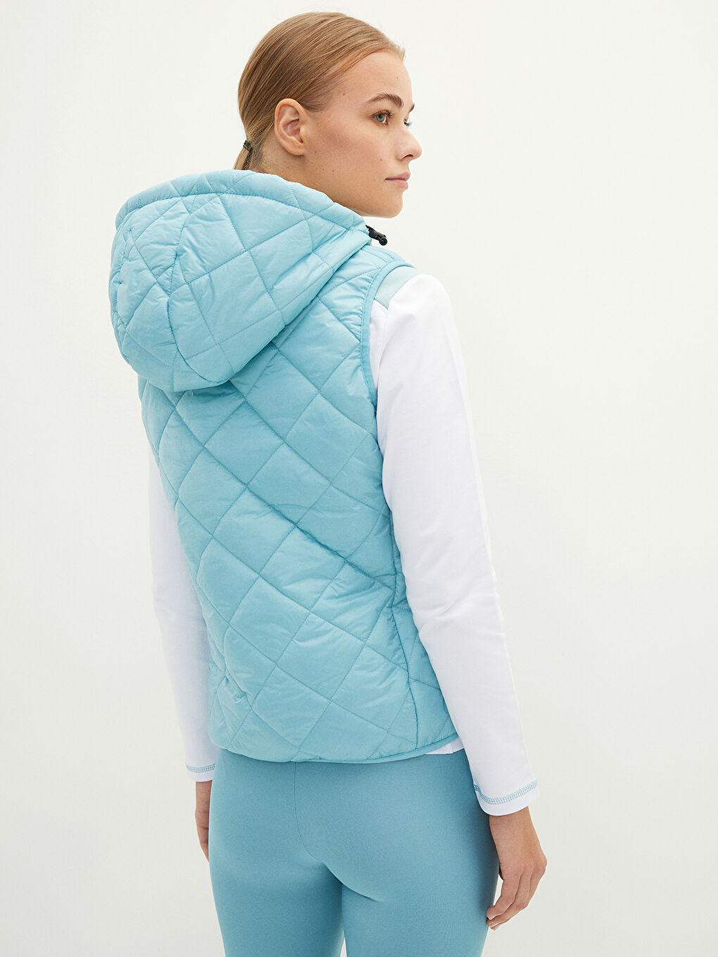 Mavi Kapüşonlu Kapitone Desenli Kadın Yelek-4