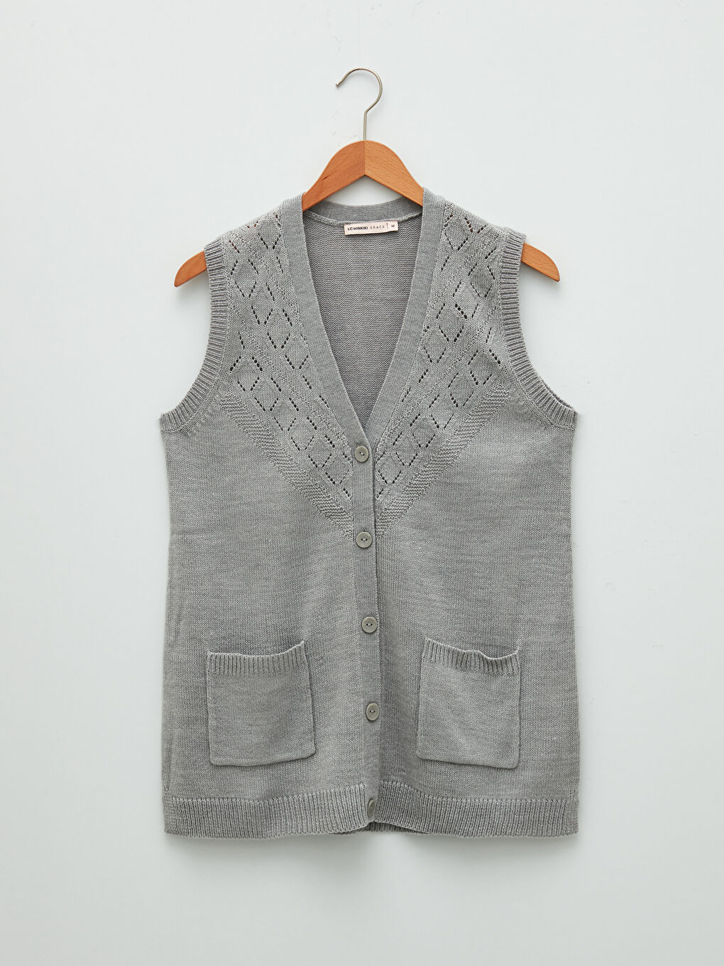 فيست تريكو للسيدات بياقة على شكل حرف V مخرّم تريكو-5