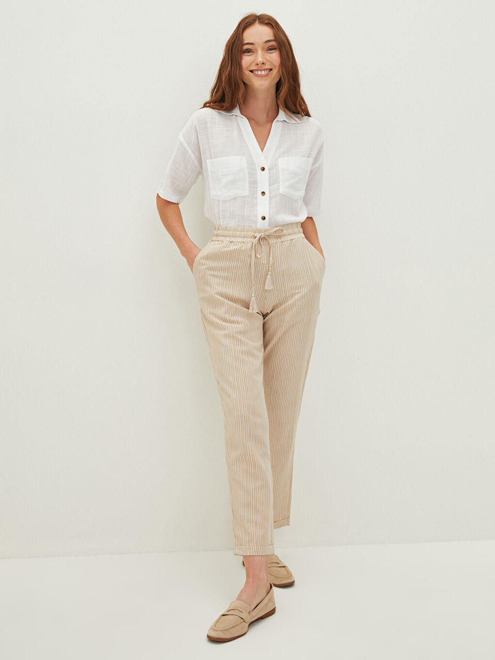 Bej Beli Lastikli Çizgili Bol Fit Cep Detaylı Kadın Pantolon-1