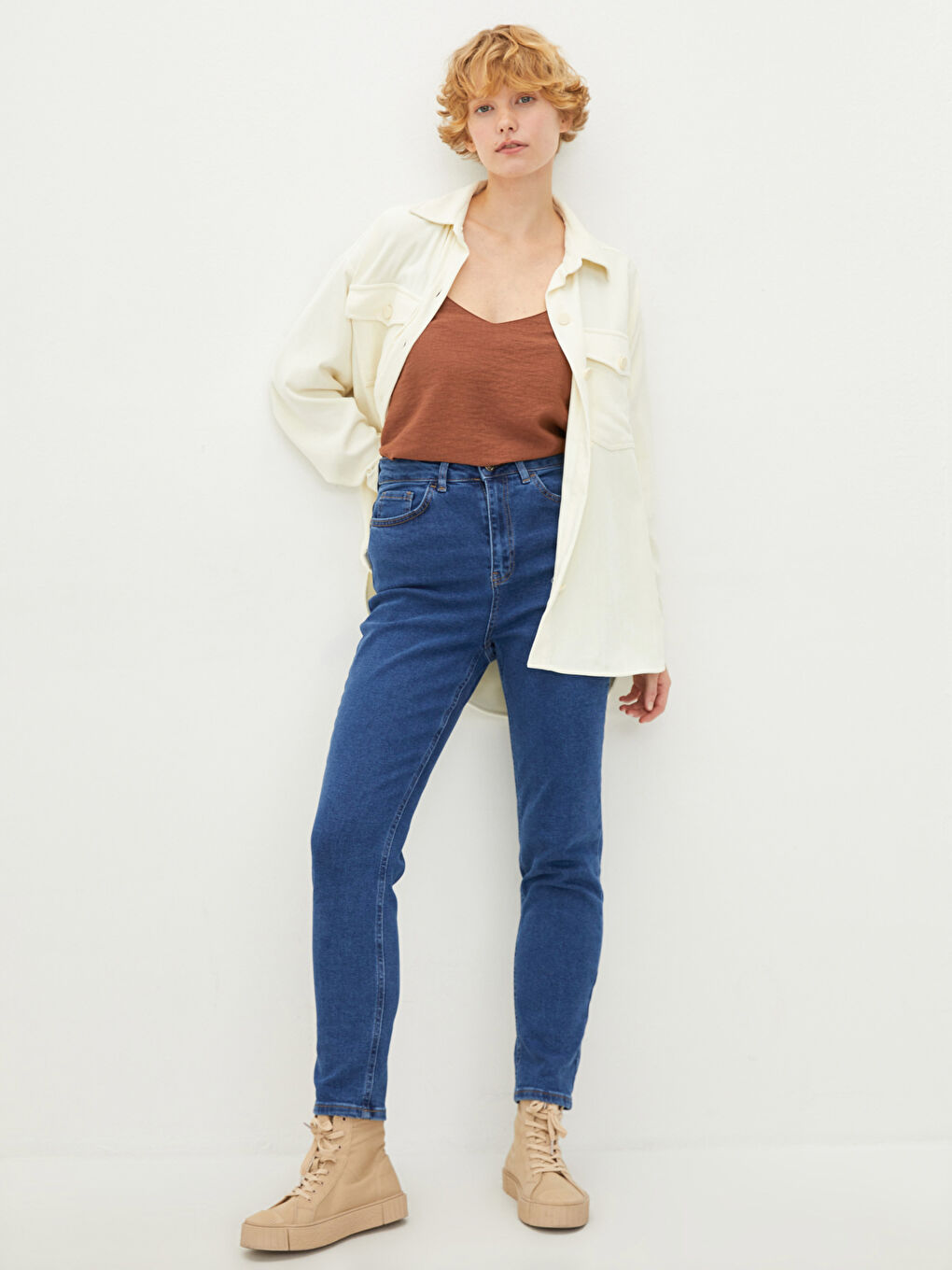 بنطلون جينز وسط عالي رفيع بجيوب للسيدات روديو