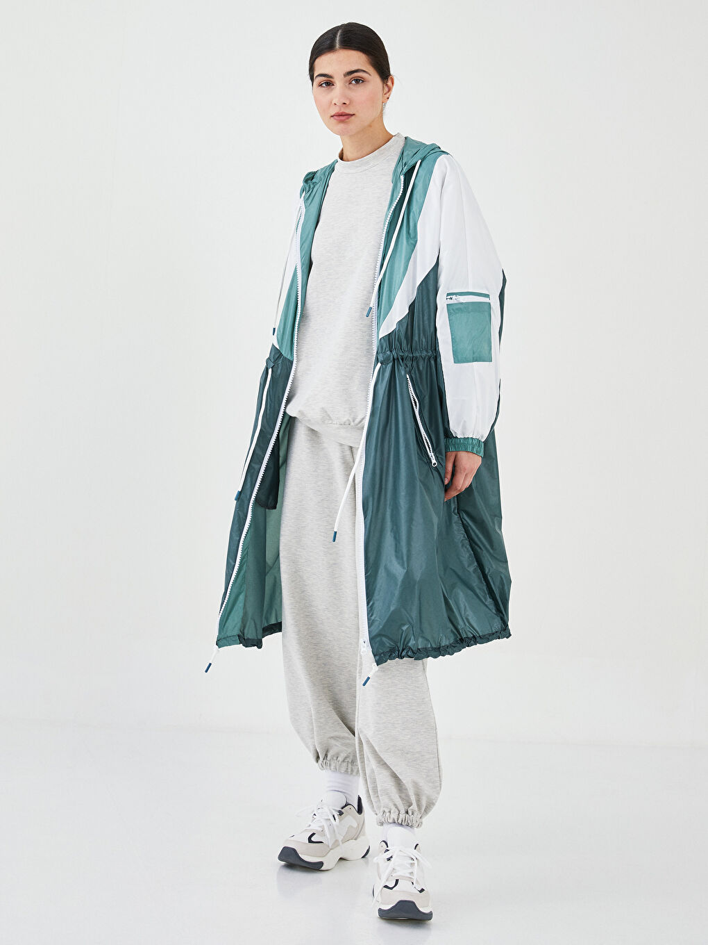 QOOQ UP Hooded Color Block Long Sleeve Women's Raincoat