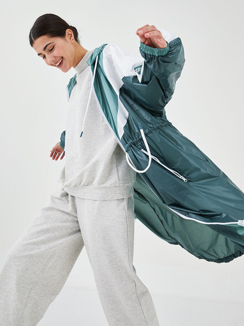 QOOQ UP Hooded Color Block Long Sleeve Women's Raincoat