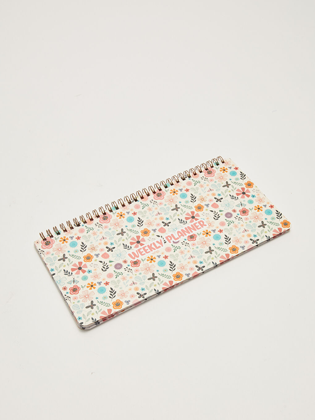 دفتر ملاحظات مخطط أسبوعي بنقشة زهرية