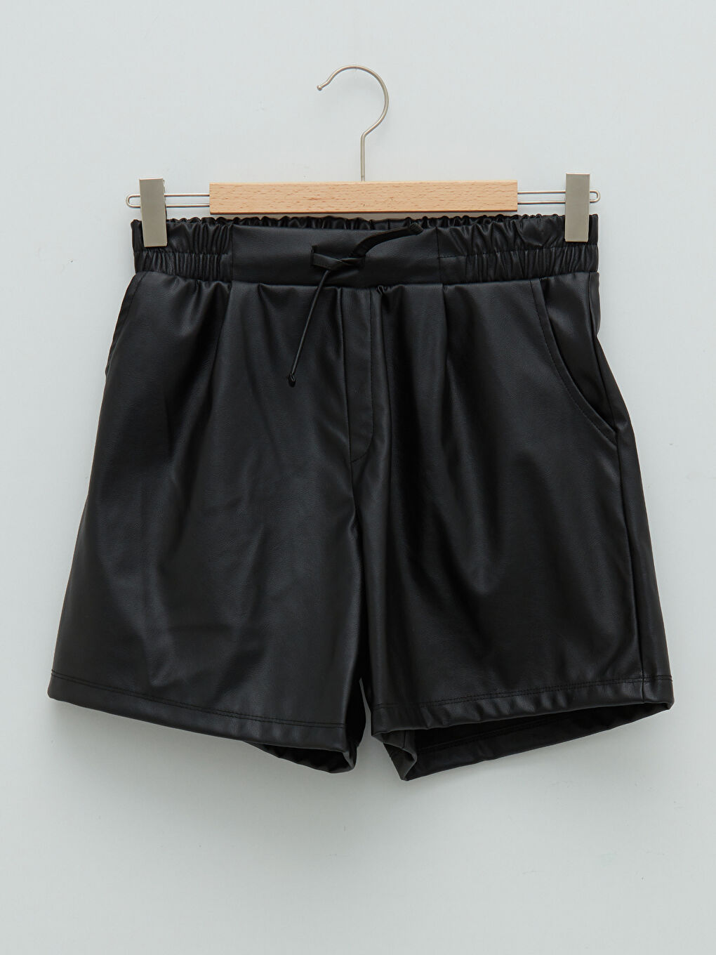Shorts en similicuir à taille élastique pour fille