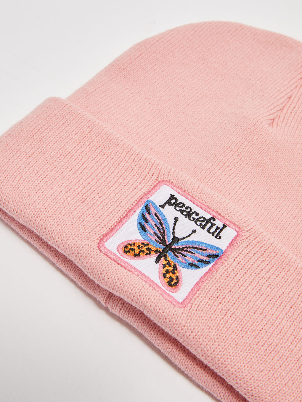 Pembe Etiket Baskılı Kız Çocuk Triko Bere-1