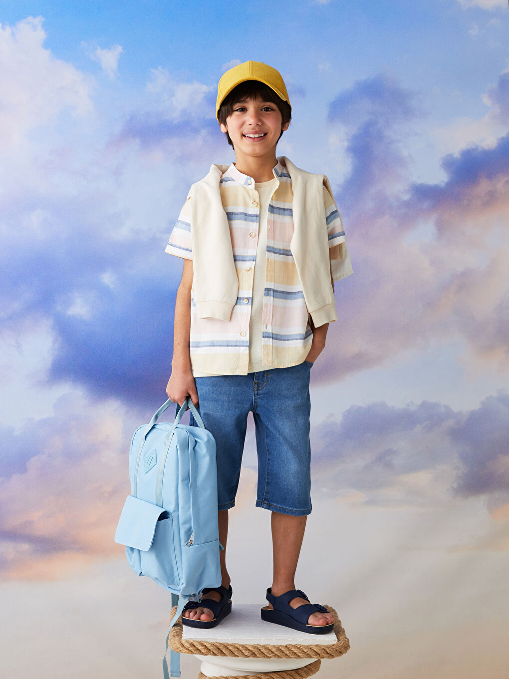 شورت جينز أولاد بسيط