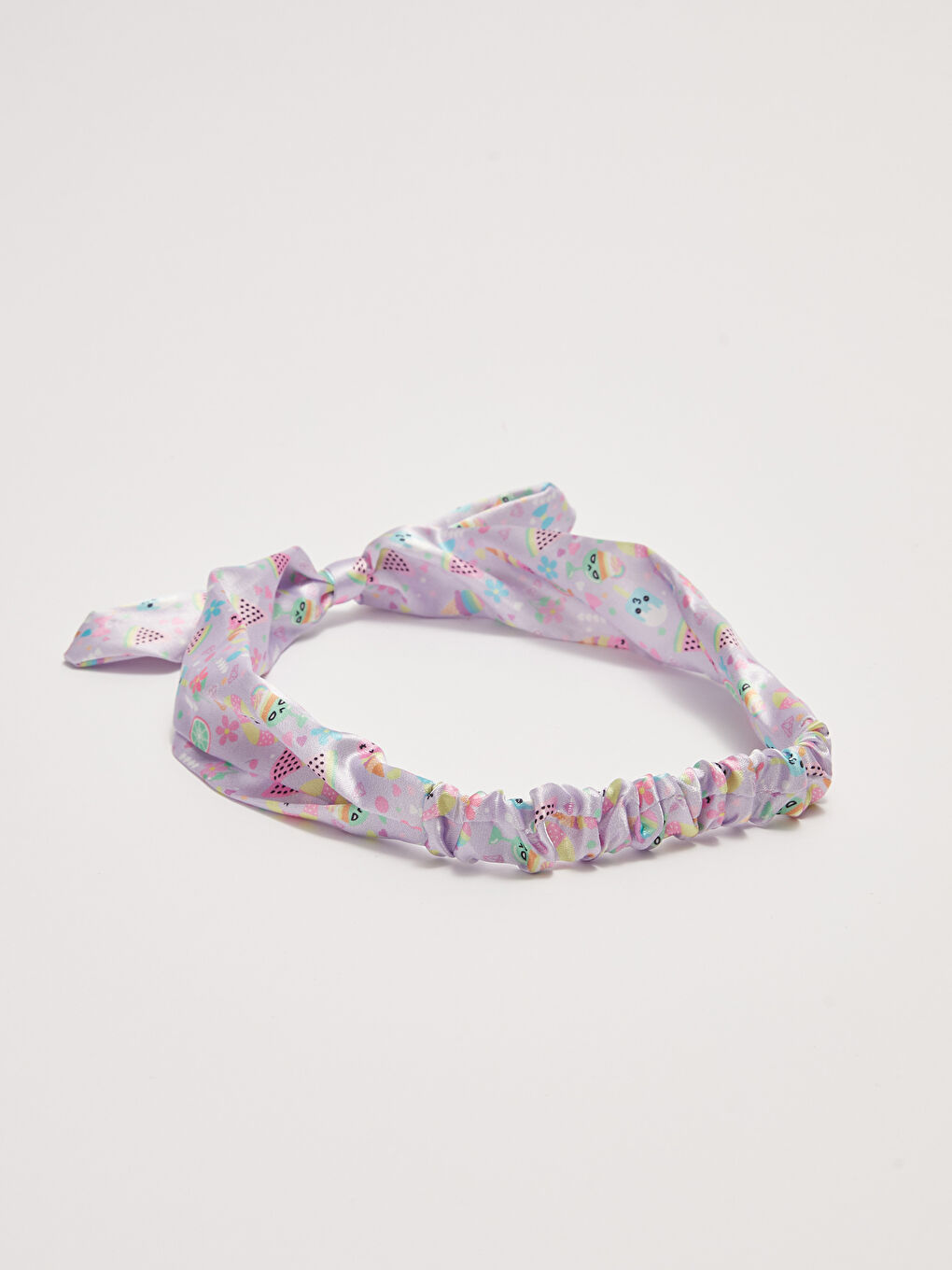 طوق شعر بناتي بتفاصيل فيونكة مطبوعة-1