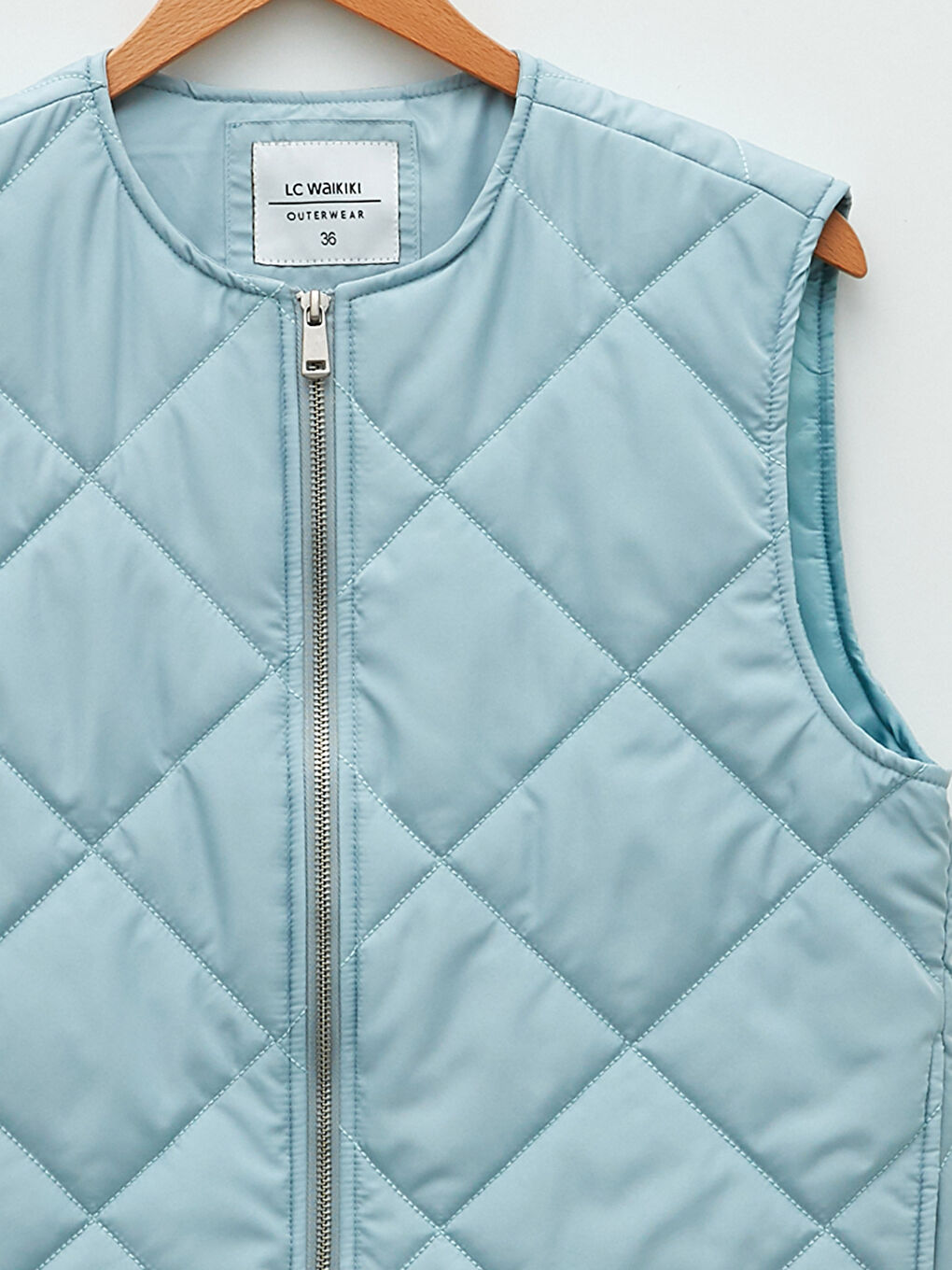 فيست منتفخ منقوش بياقة دائرية للسيدات-8