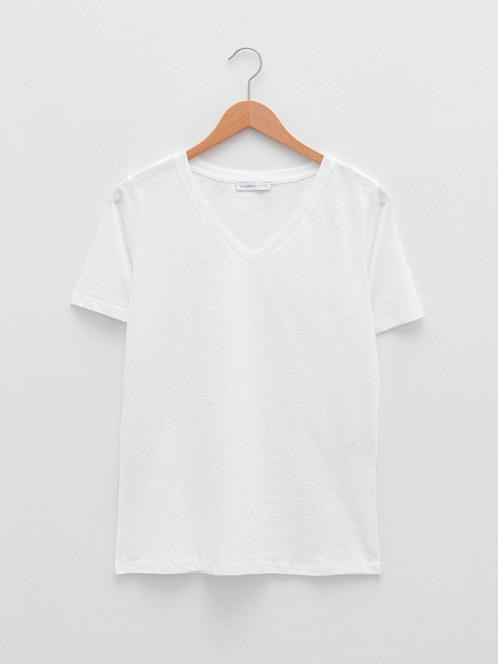 تي شيرت قطن ياقة على شكل حرف V كم قصير للسيدات-4