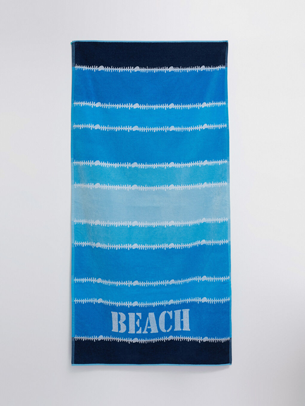 منشفة شاطئ مخططة للرجال