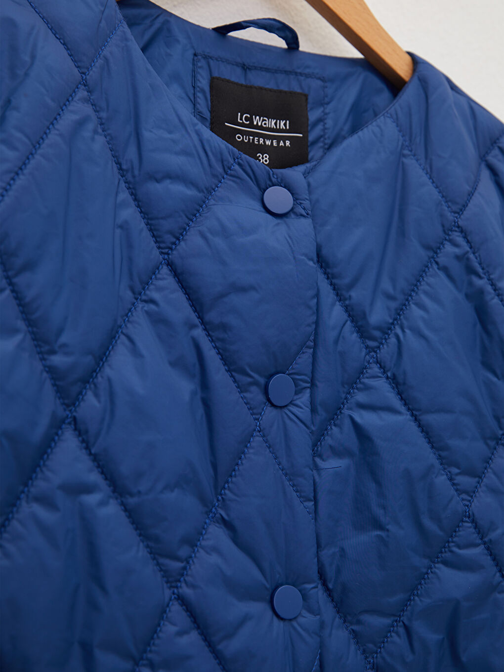 Mavi Bisiklet Yaka Kapitone Desenli Uzun Kollu Kadın Şişme Mont-8