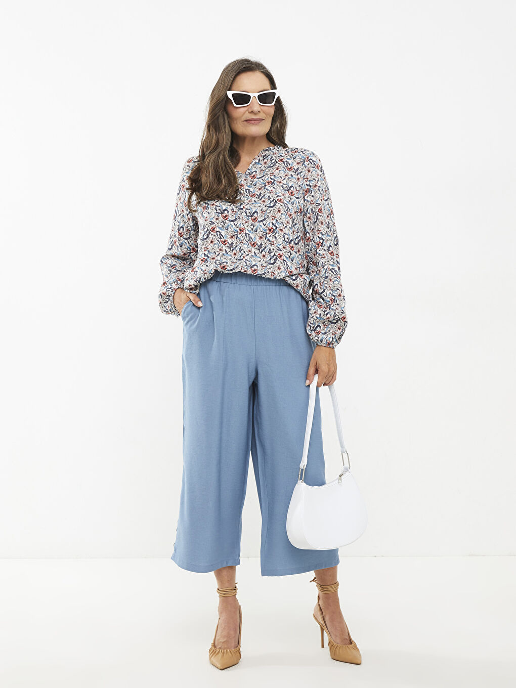 Mavi Beli Lastikli Rahat Kalıp Düz Cep Detaylı Kadın Kapri