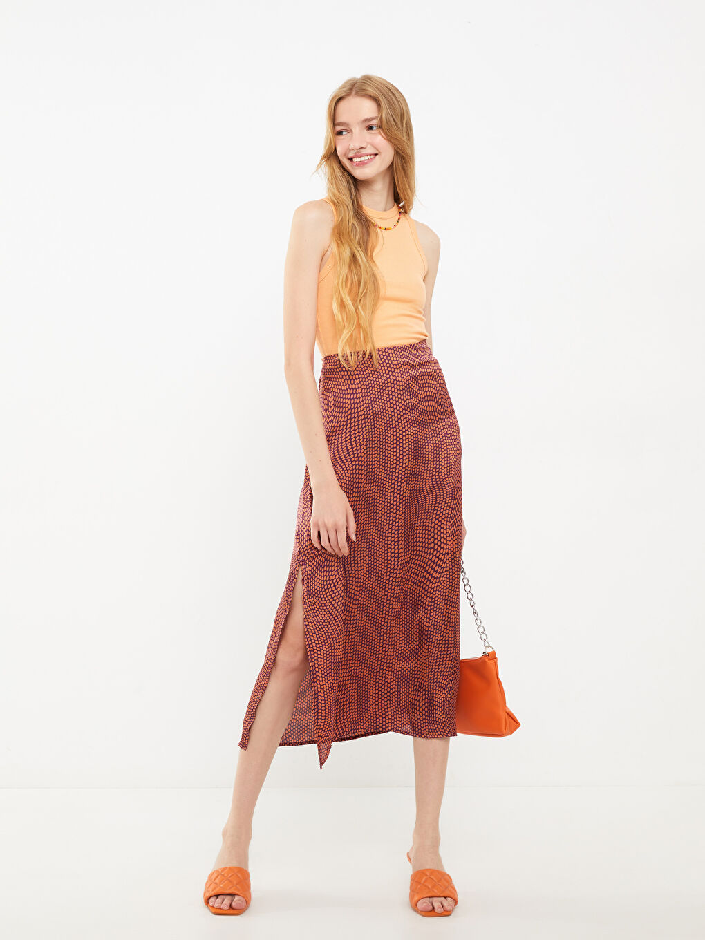 Mor Yırtmaç Detaylı Desenli Kadın Etek