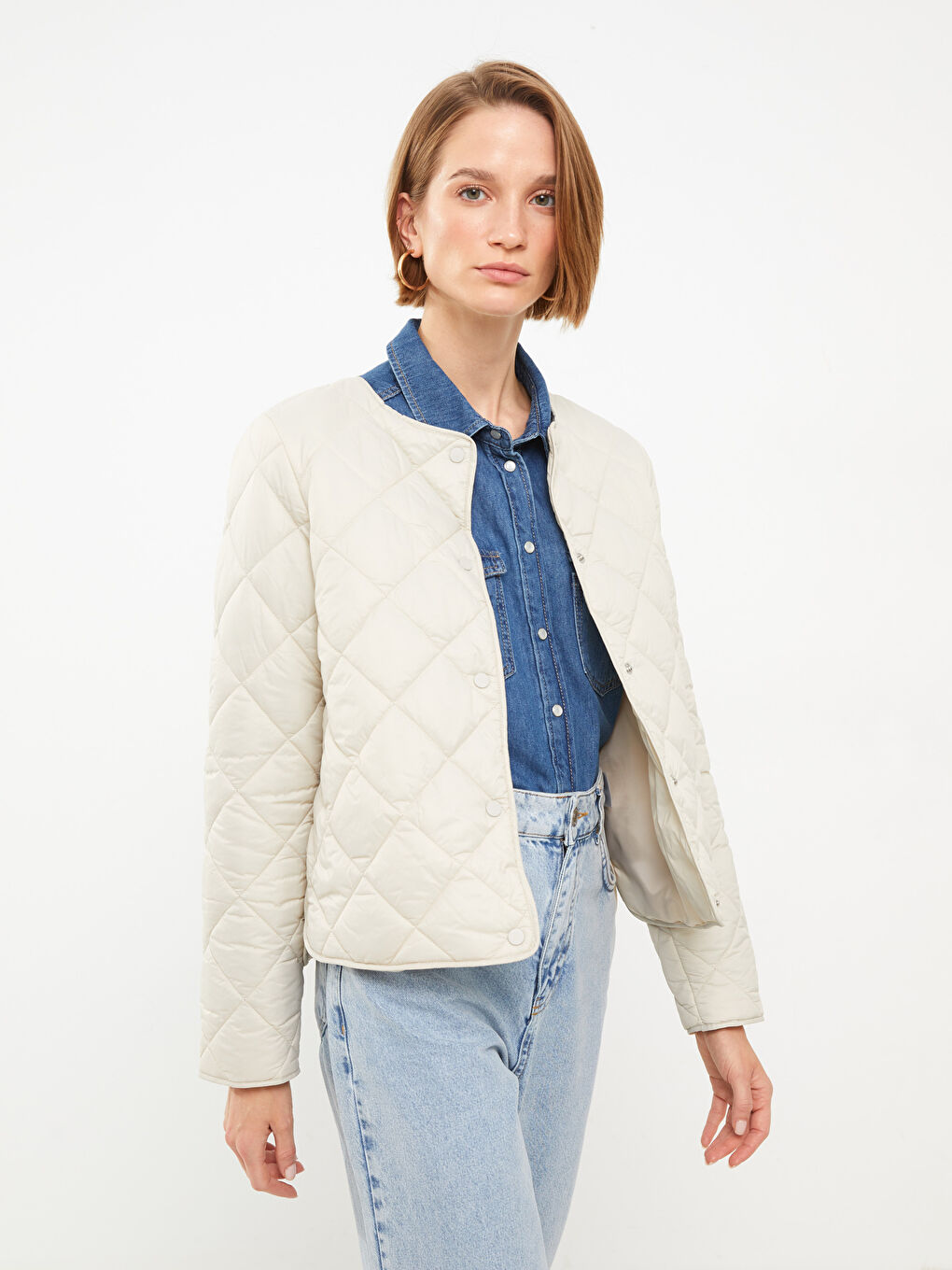 Bej Bisiklet Yaka Kapitone Desenli Uzun Kollu Kadın Şişme Mont