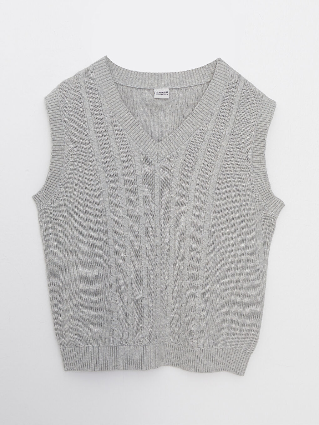 یەلەگی بلوزی تریكۆی نەخشدار یاخەی V کچان