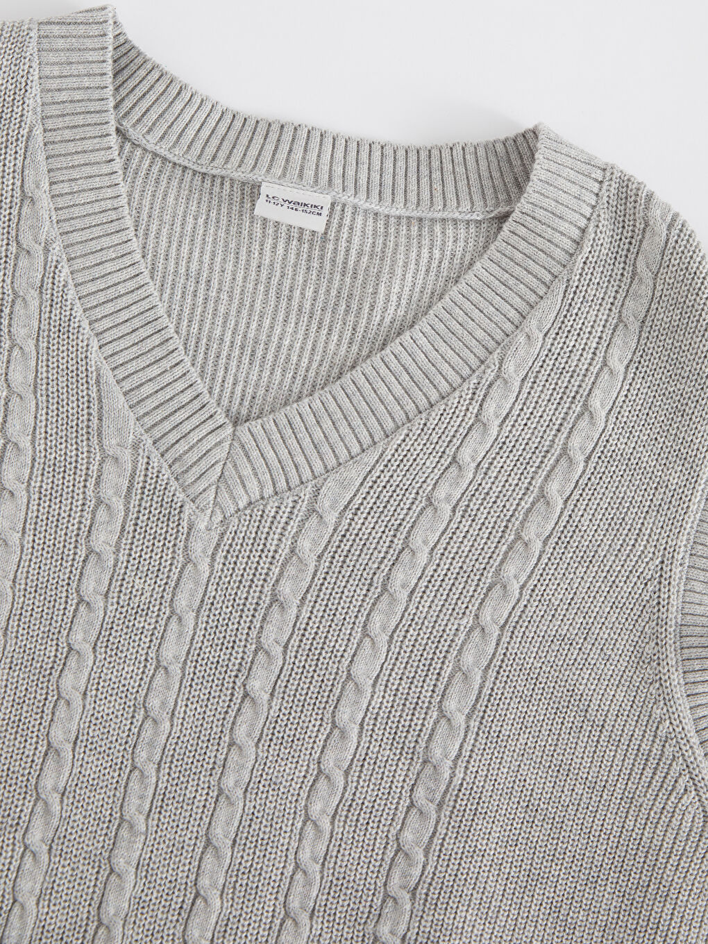 یەلەگی بلوزی تریكۆی نەخشدار یاخەی V کچان-2