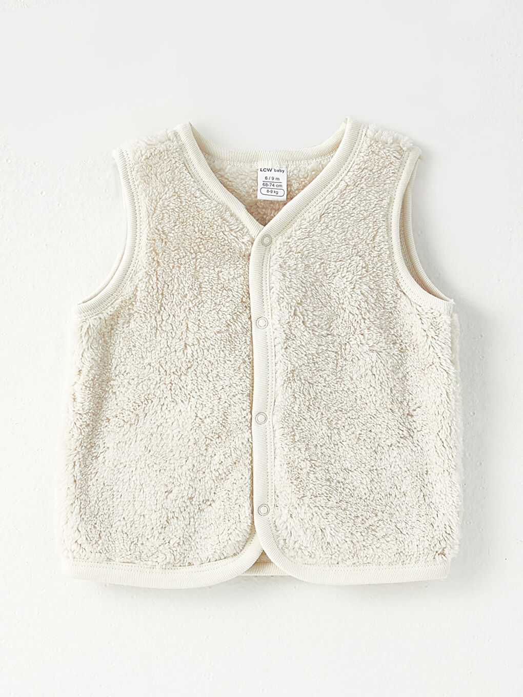 Vestă pluș pentru bebeluși fete cu decolteu în V