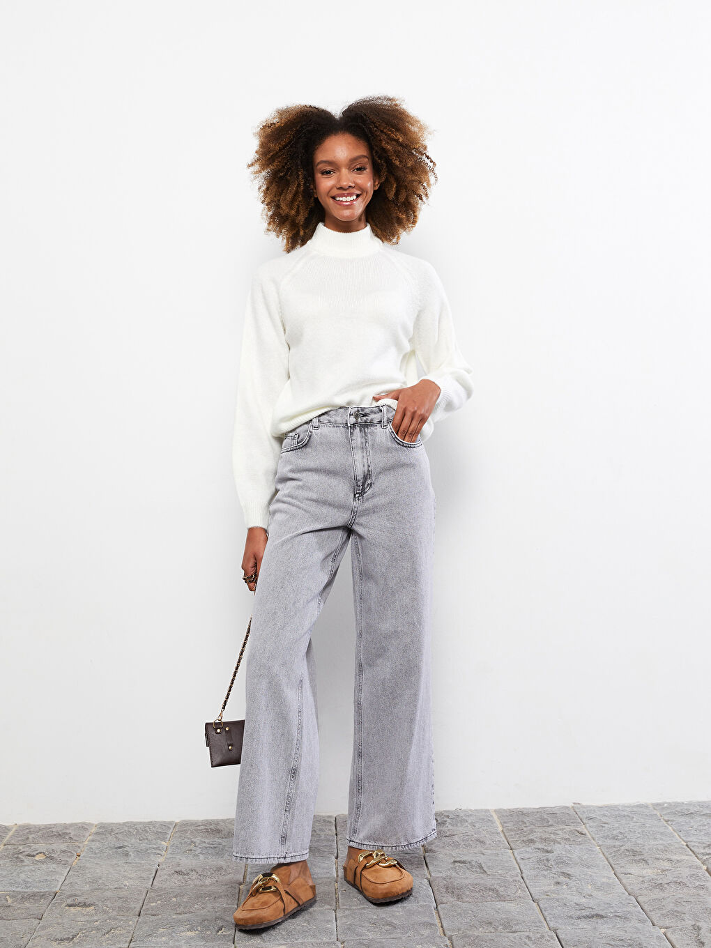 بلوفر تريكو بياقة هاي نيك للسيدات