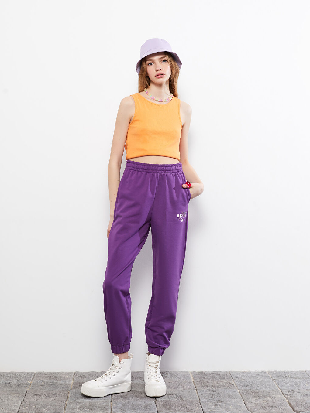 بنطلون رياضي بخصر مطاطي بتفاصيل جيب مطبوع للسيدات