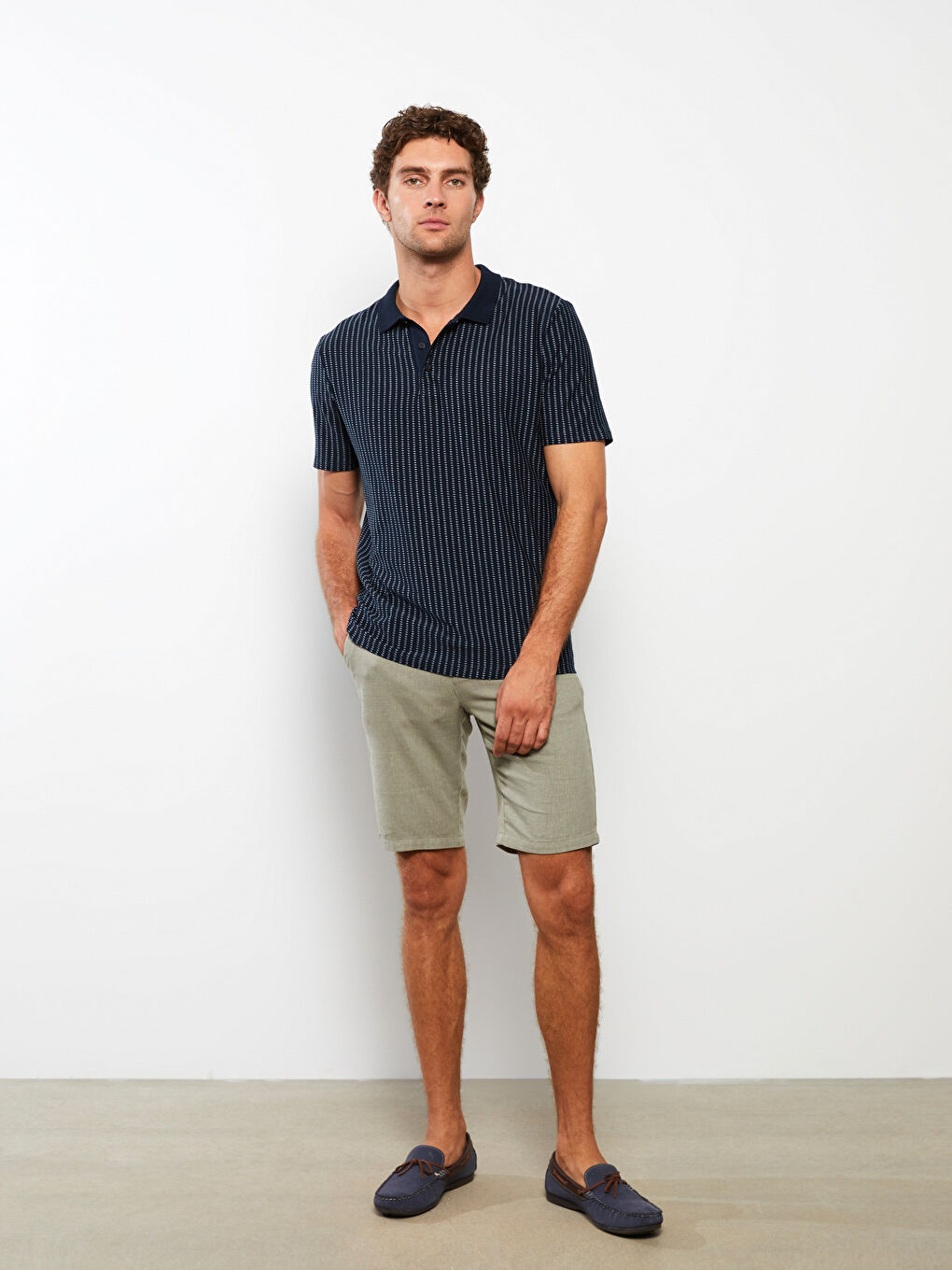 تي شيرت رجالي بياقة بولو كم قصير مخطط بيكيه