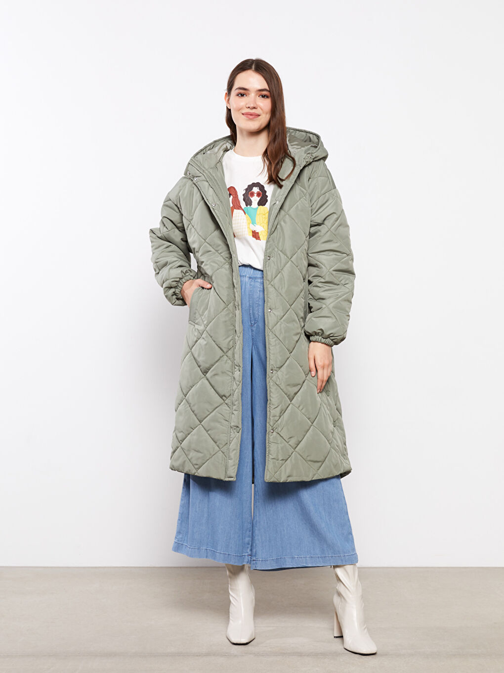 Yeşil Kapüşonlu Kapitone Desenli Uzun Kollu Kadın Şişme Mont