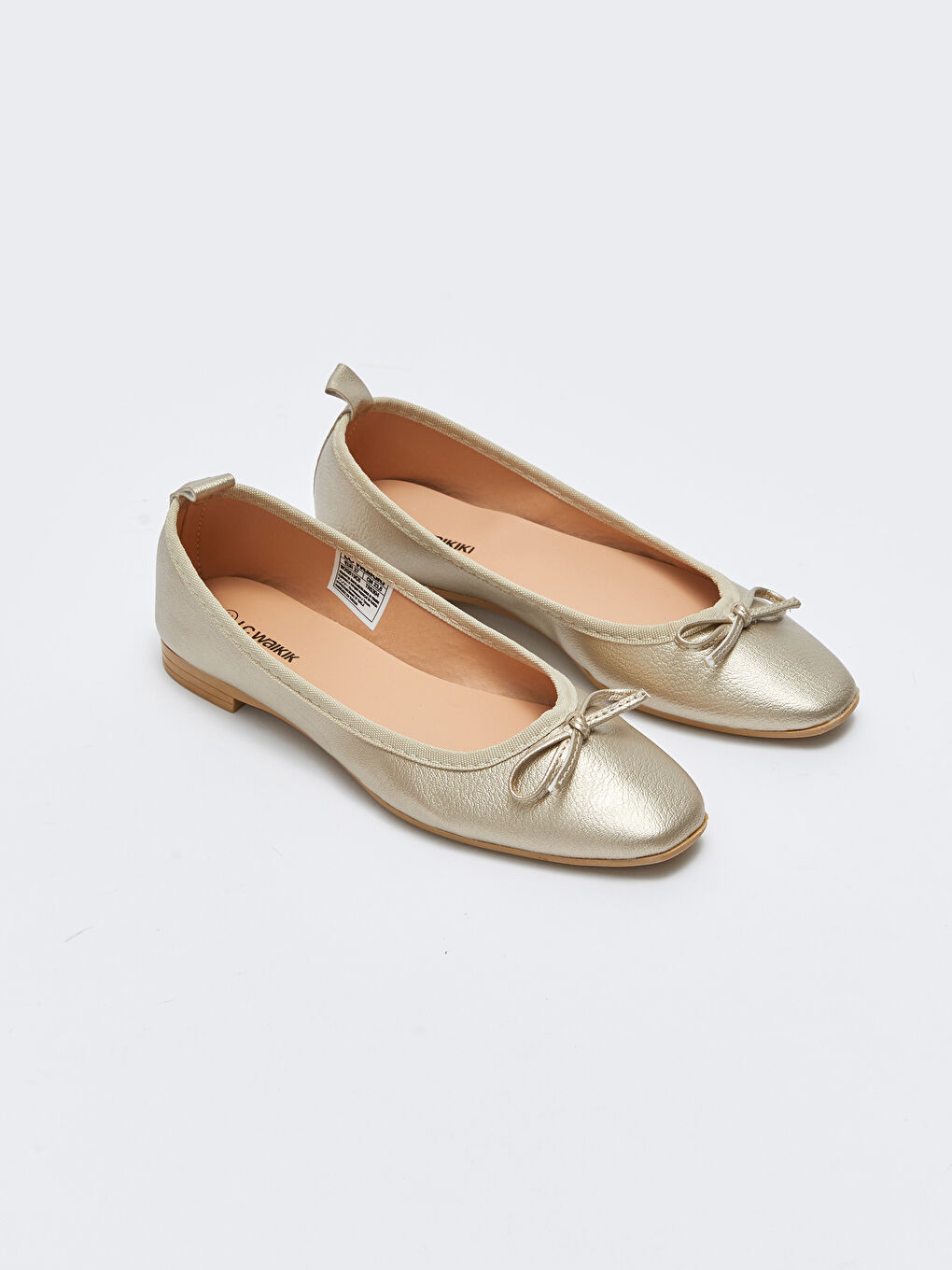 Bej Deri Görünümlü Fiyonklu Kadın Babet