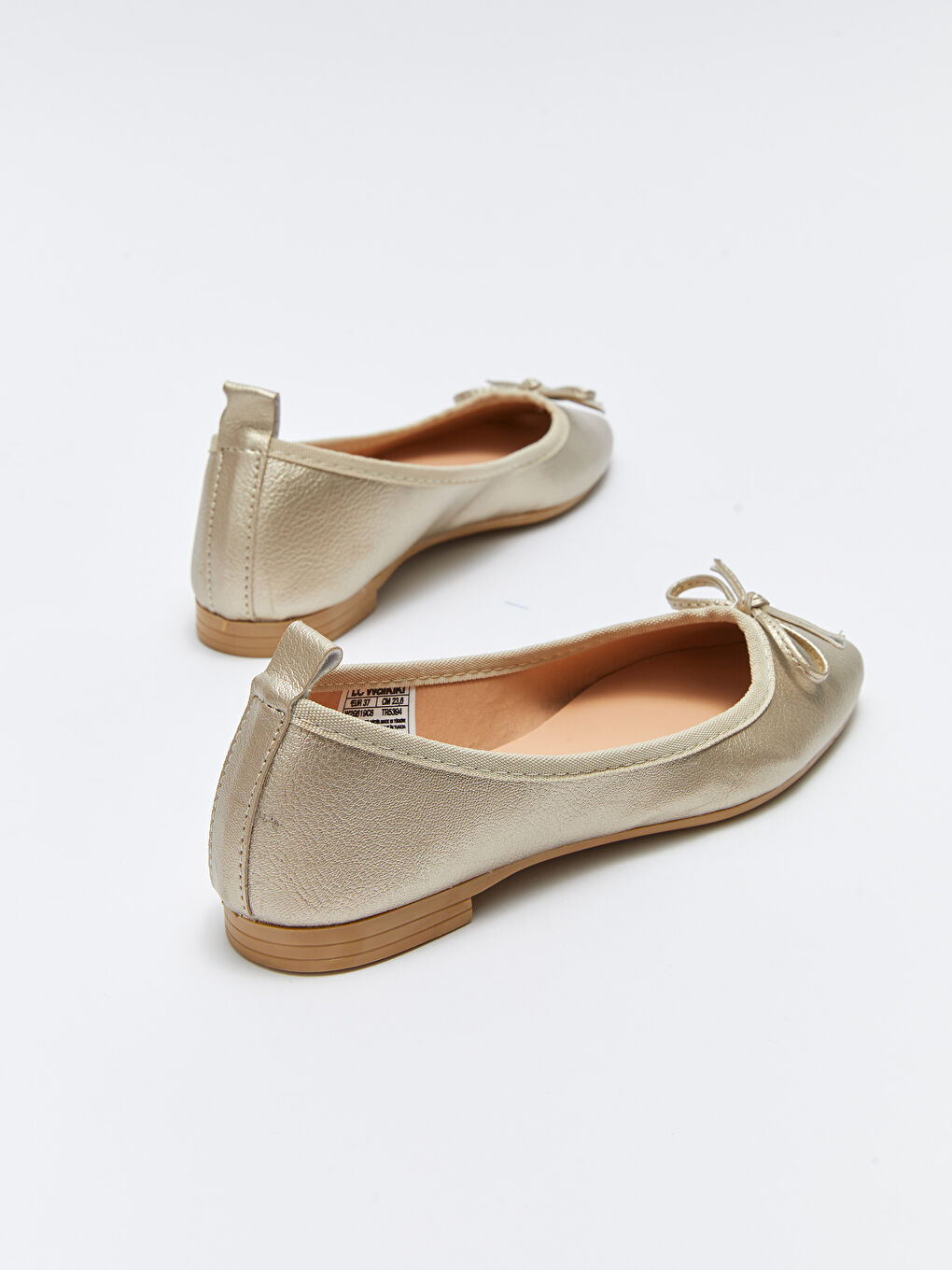 Bej Deri Görünümlü Fiyonklu Kadın Babet-4