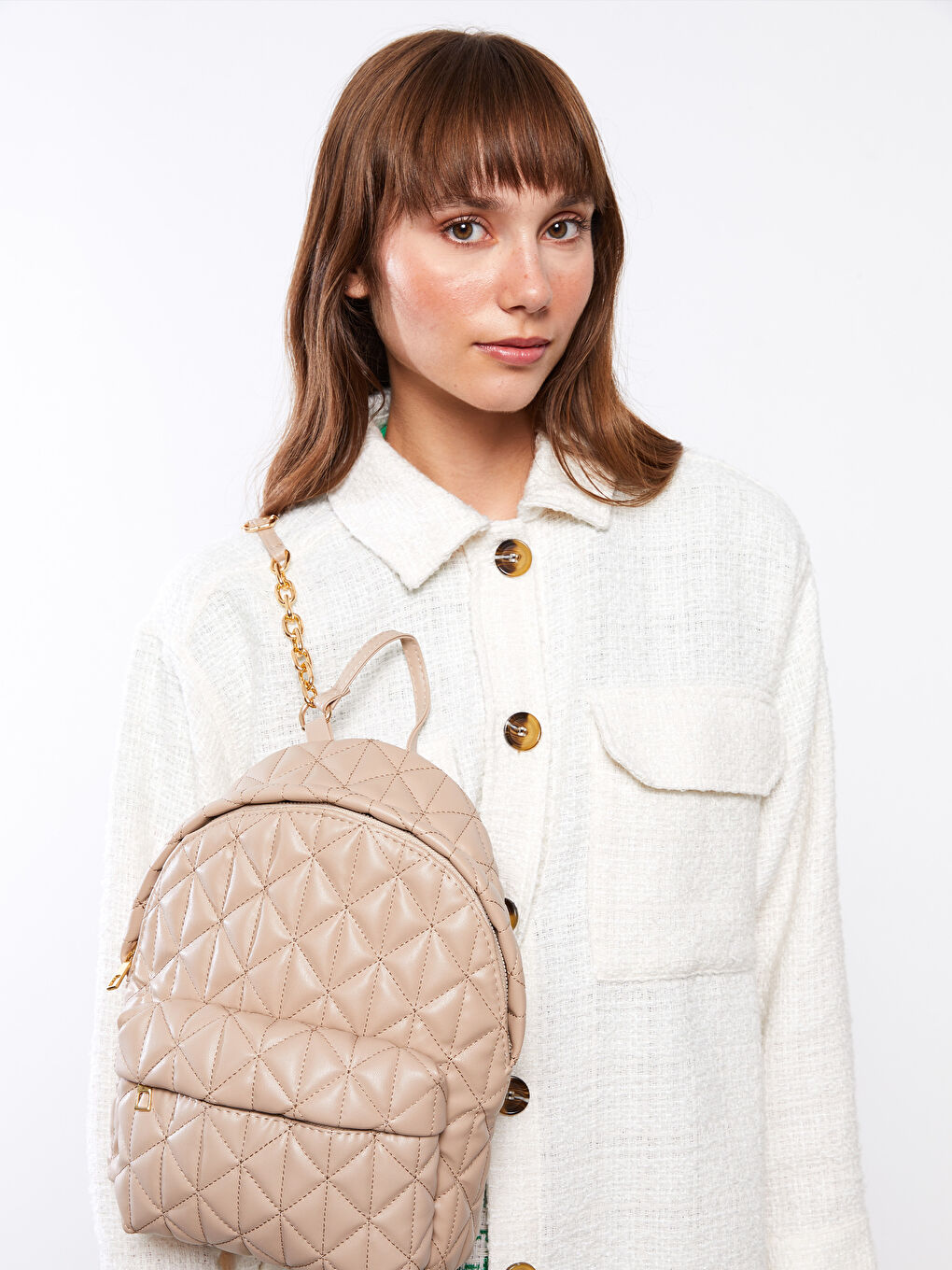 Bej Deri Görünümlü Kapitoneli Kadın Sırt Çantası