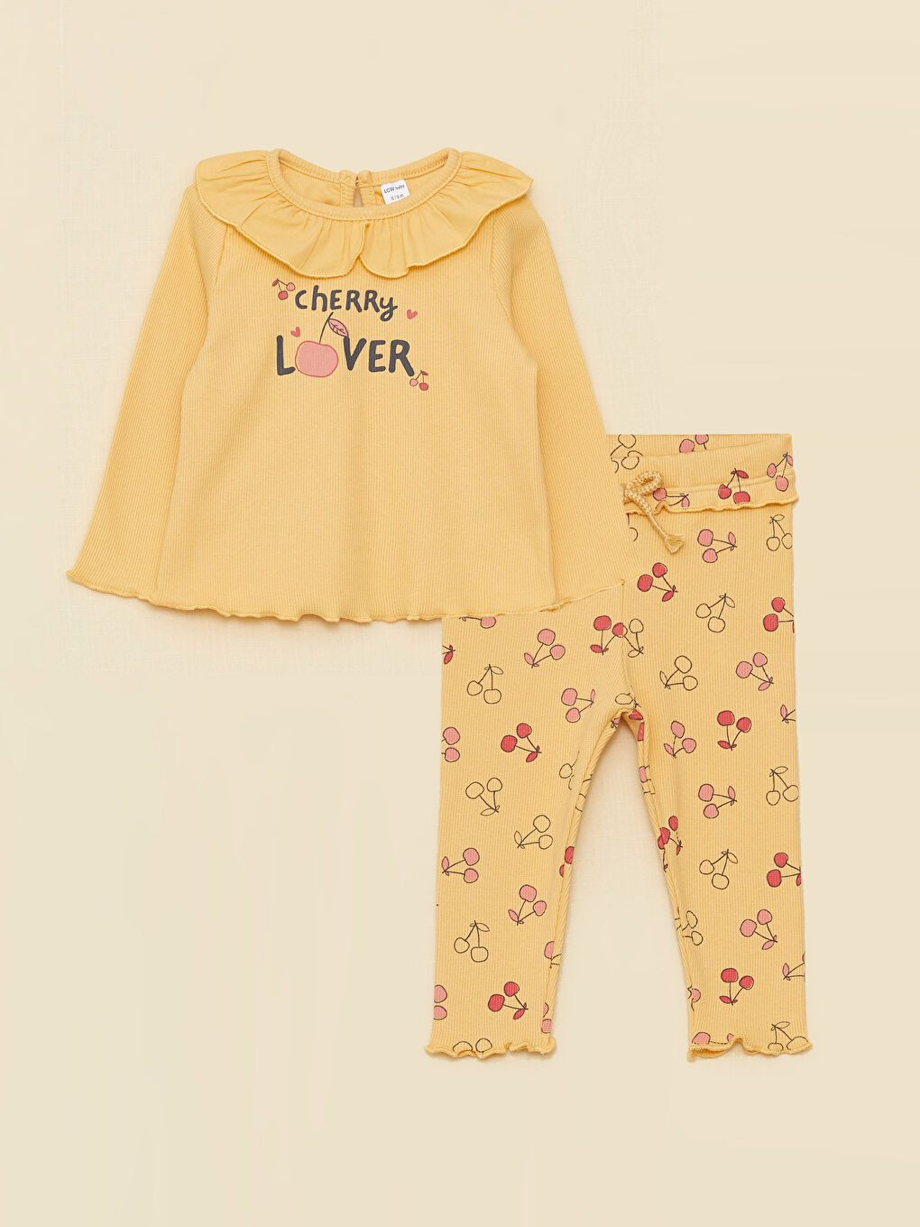 Дөңгелек жағалы ұзын жеңді принтті мақтадан жасалған қыз балаға арналған блузка мен леггинс жинағы