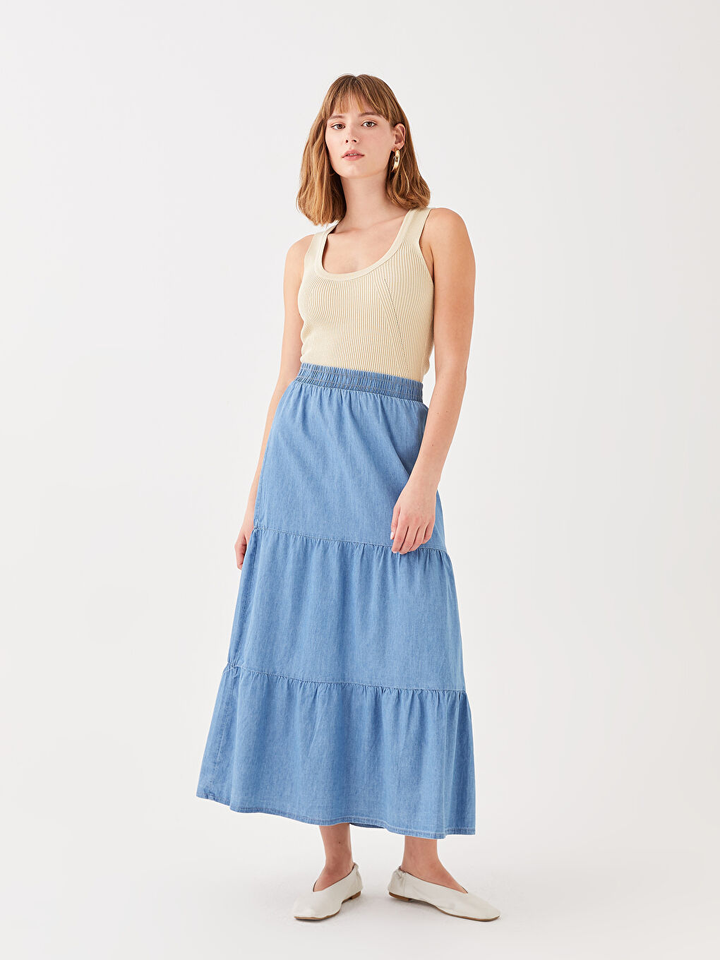 جيبة دينيم سادة بخصر مرن للسيدات