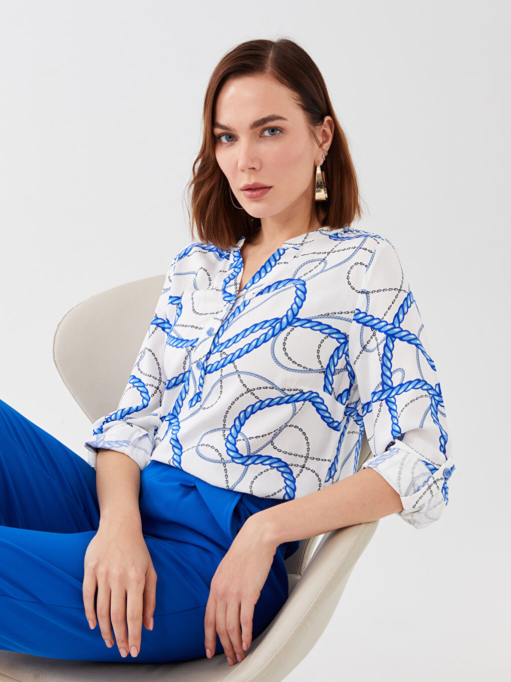 Mavi Kaçık Yaka Desenli Uzun Kollu Kadın Bluz