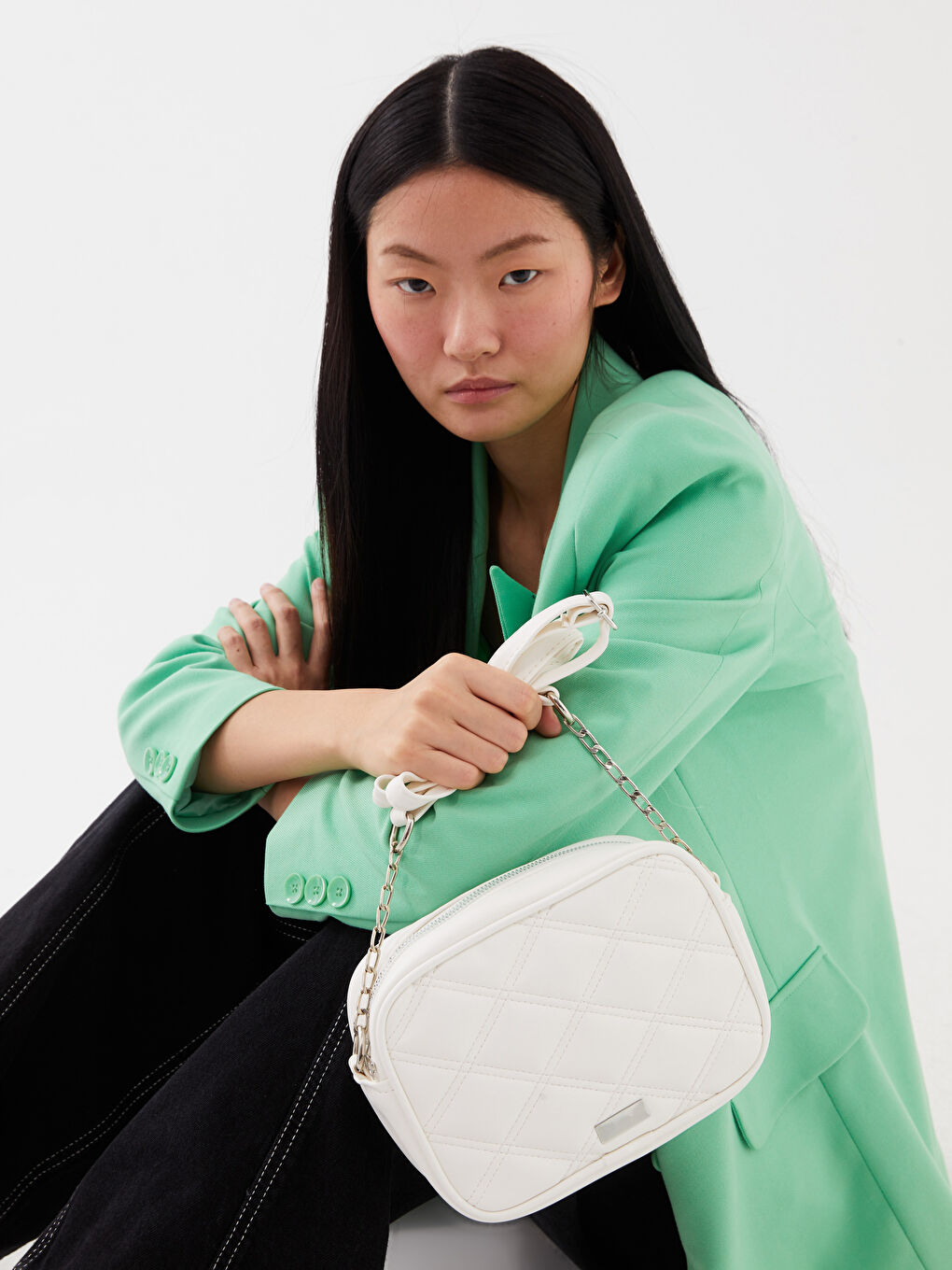 حقيبة كروس بودي مبطنة بمظهر الجلد للسيدات-1