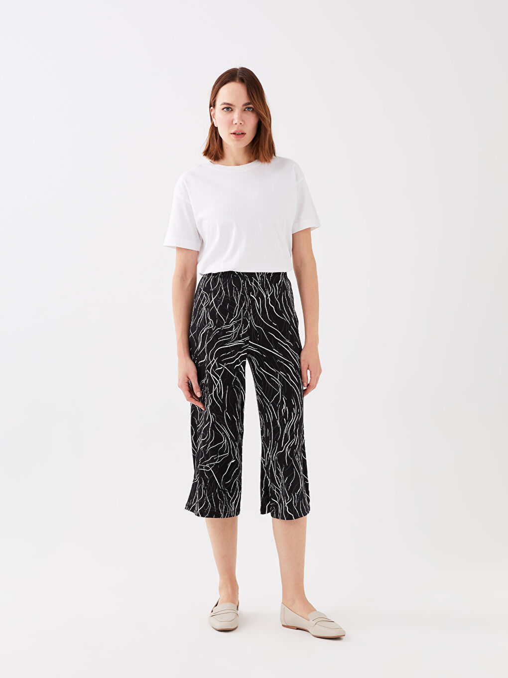 Siyah Beli Lastikli Desenli Kadın Kapri-1