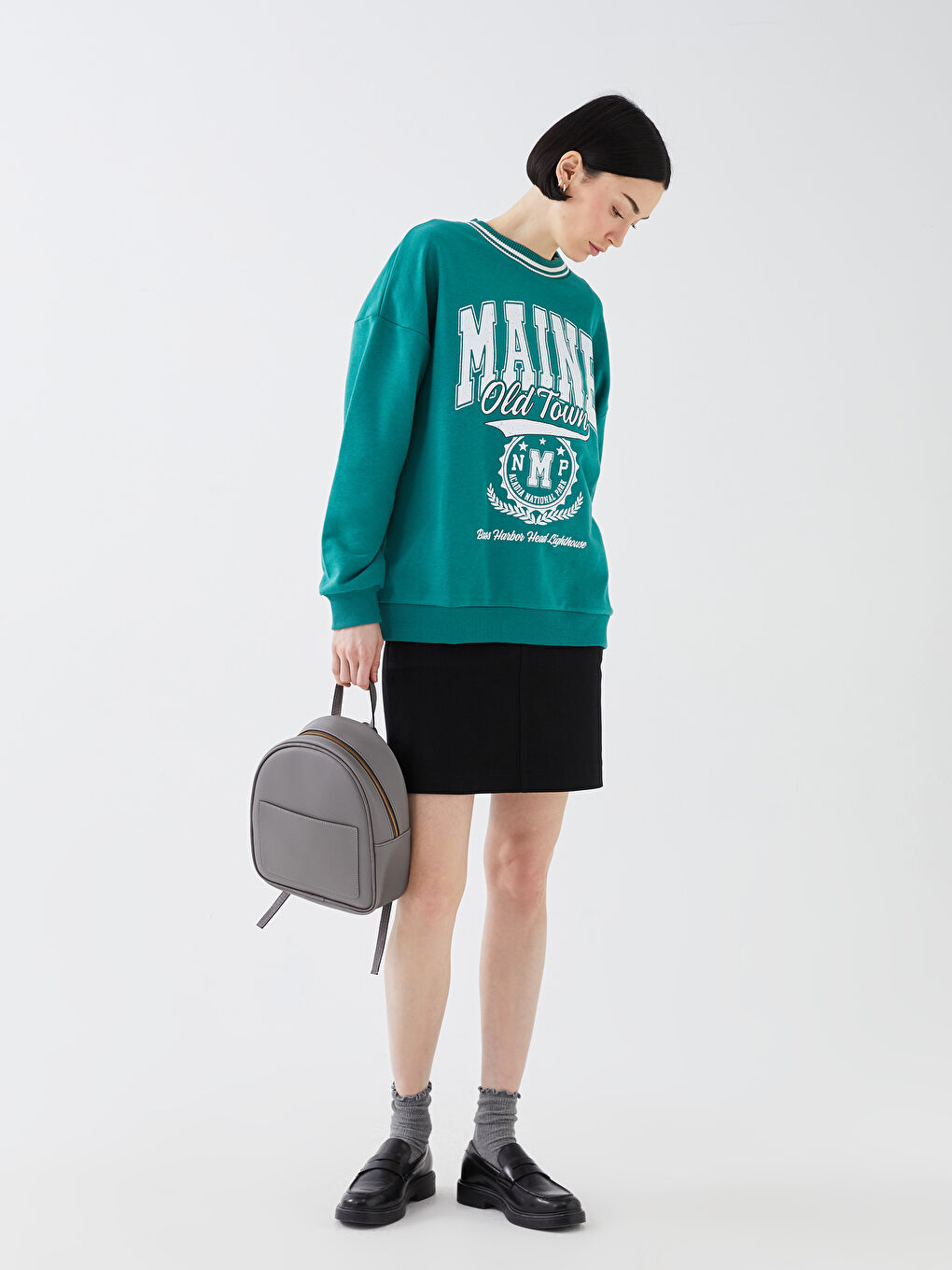 حقيبة ظهر للسيدات بمظهر الجلد-1